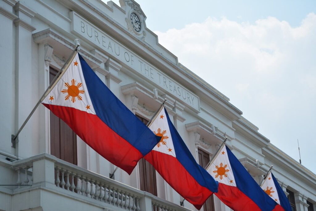 Philippines flag flying in capital city of Manila