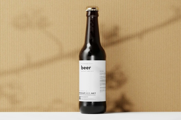 Homebrewed beer bottle with a custom label against a neutral background