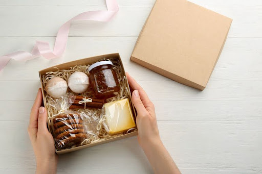 A woman holding a gift box with irresistible gifts