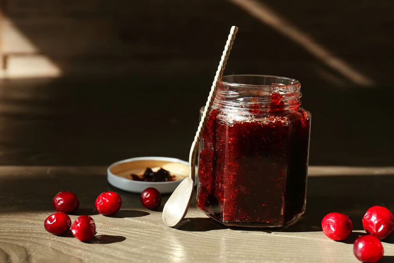 Jar of cherry fruit purée ready to be used in secondary fermentation