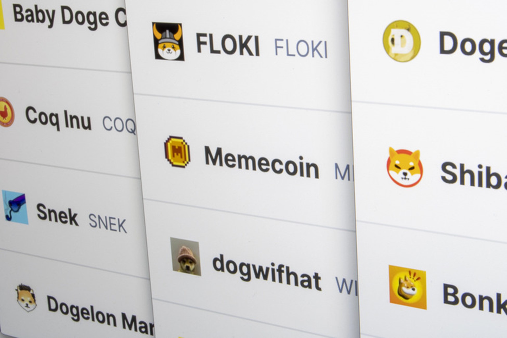 A screen displaying various meme cryptocurrencies, including Dogecoin, Floki, Memecoin, and Shiba Inu
