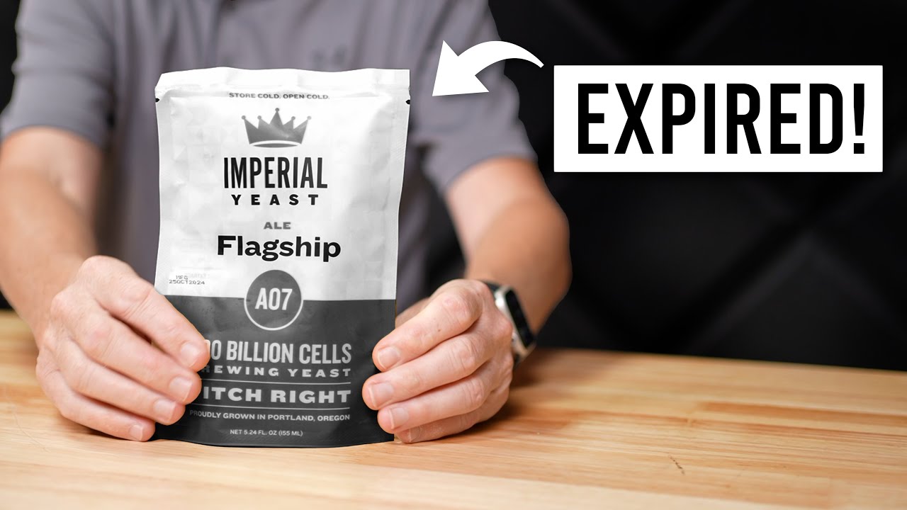 Brewer holding pouch of Imperial Yeast A07 Flagship